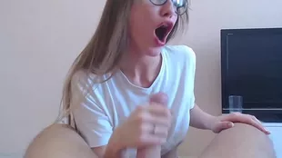 A sexy adult teenager in round dull glasses causes real irritation