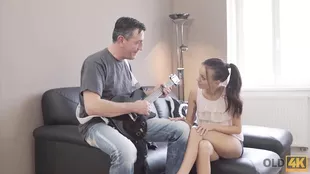 A European lady gets seduced by an accomplished guitarist